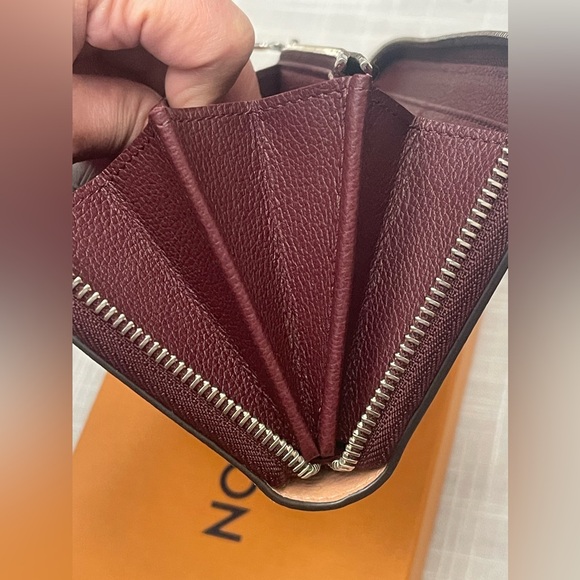 LOUIS VUITTON Zippy Lock Me Leather Wallet - Picture 11 of 14